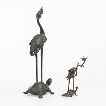 Two bronze sculptures/candle holders, Japan & China, 20th century.