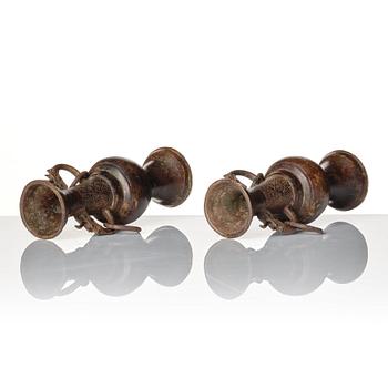 A pair of bronze altar vases, Ming dynasty (1368-1644).