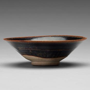 582. A cizhou type russet-splashed black glazed bowl, Song dynasty (960-1279).