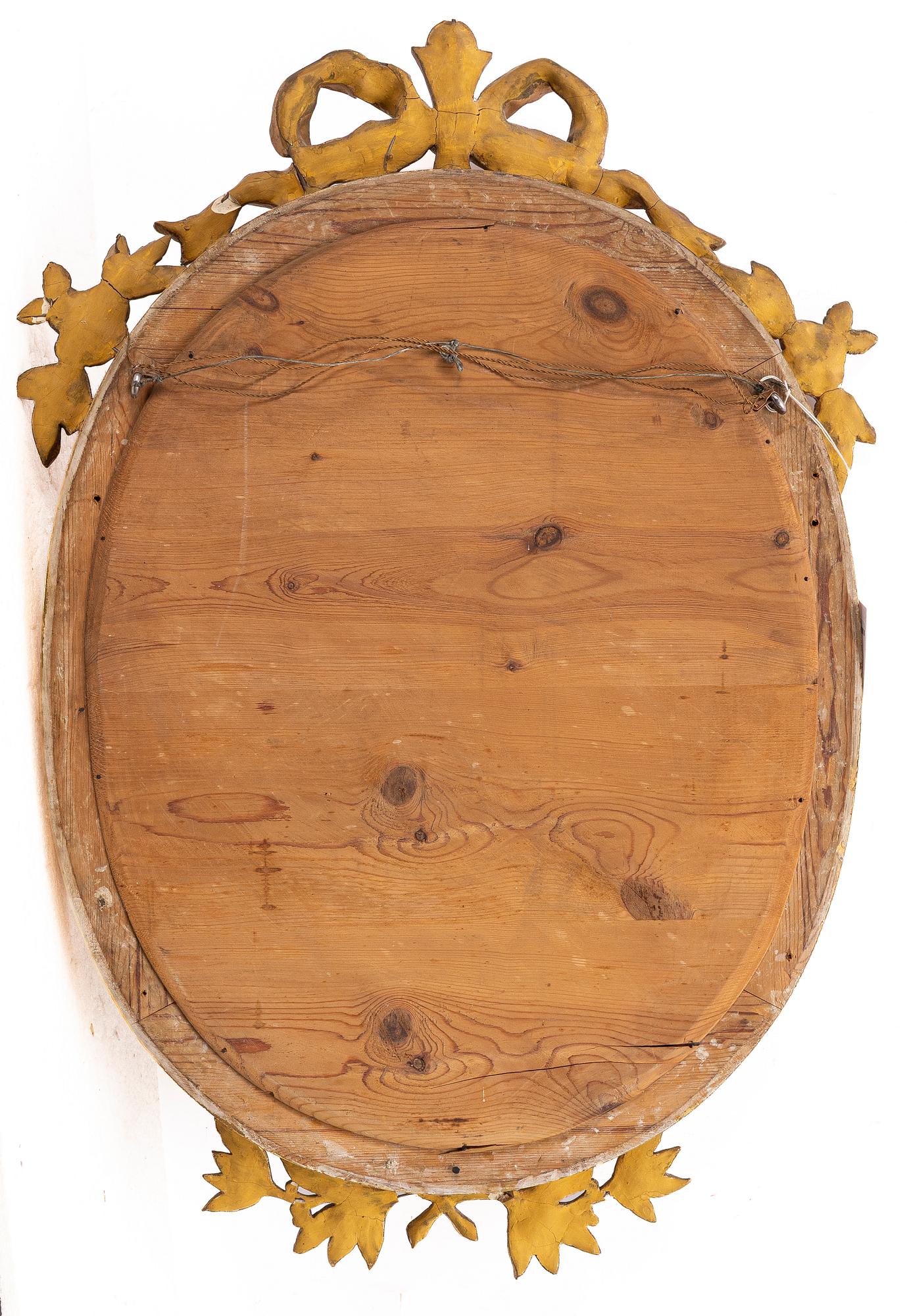 A Gustavian style mirror, early 20th century.