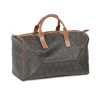 706. CHRISTIAN DIOR, a brown bag and briefcase.