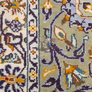 A Keshan carpet, signed, c. 410 x 297 cm.