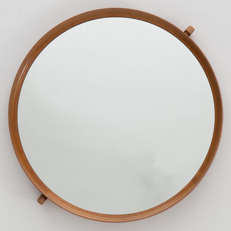 A mirror by Uno & Östen Kristiansson, Luxus, Vittsjö.