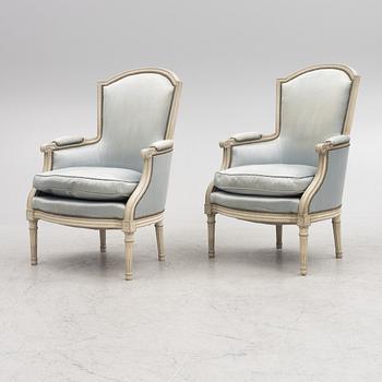 Bergeres, a pair, Louis XVI style, 20th century.