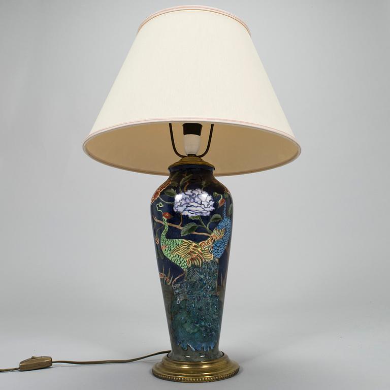 A painted porcelain table lamp, later part of the 20th century.