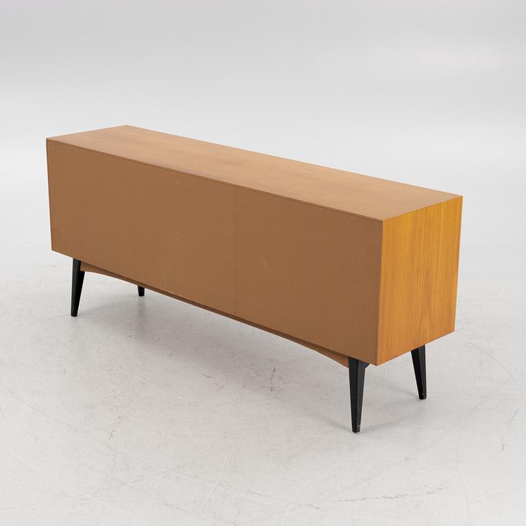 A Mid-20th Century Teak Sideboard.