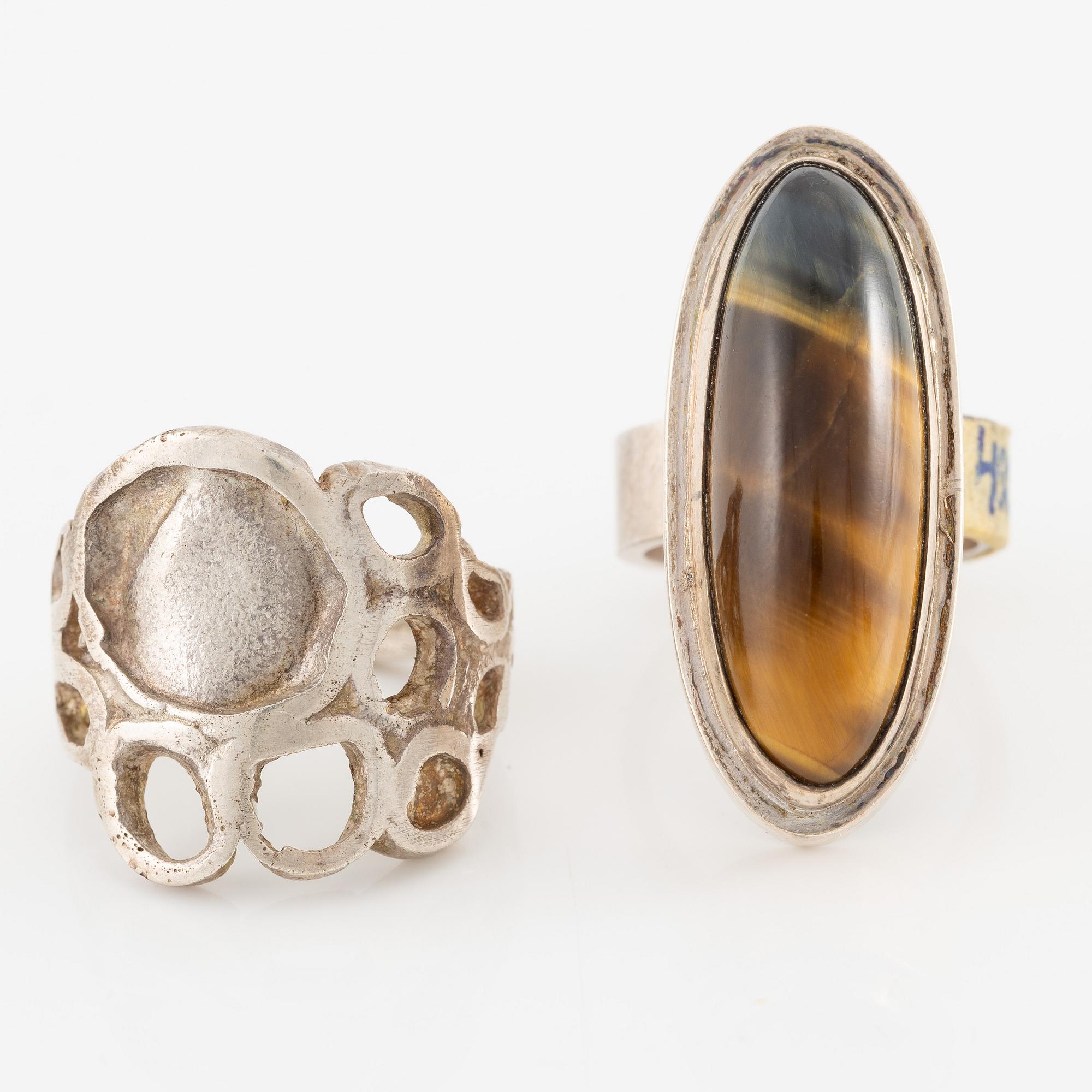 Lars Arby, fyra ringar, silver, en med tigeröga.