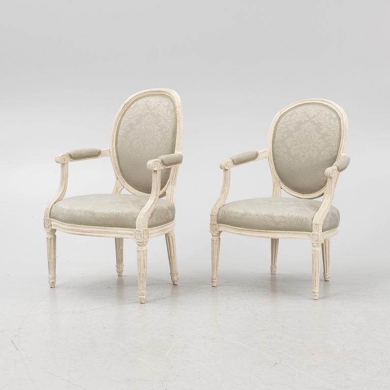 Two similar Louis XVI armchairs, France, late 18th century.