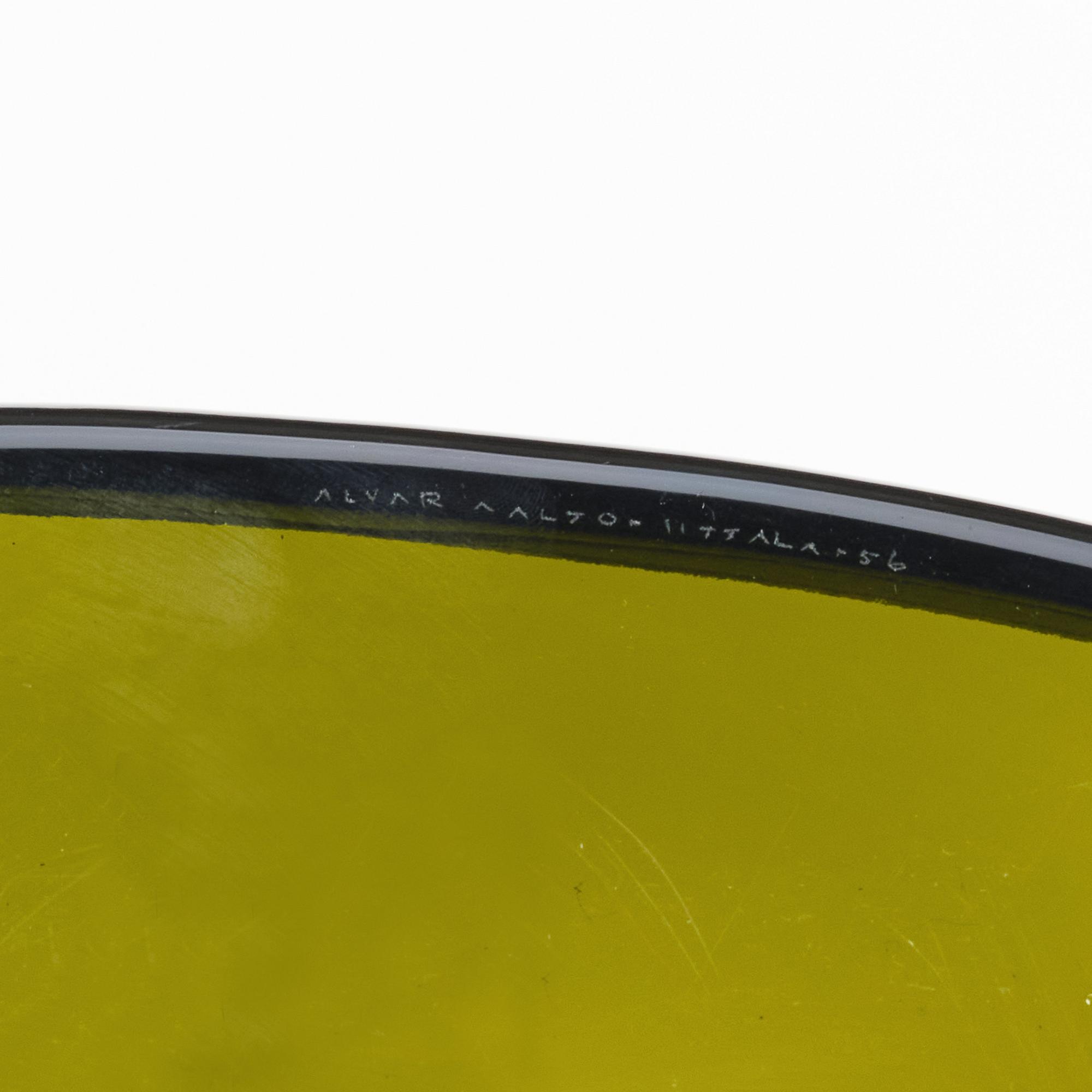 Alvar Aalto, a 'model 9769' green glass dish, Iittala, Finland 1956.