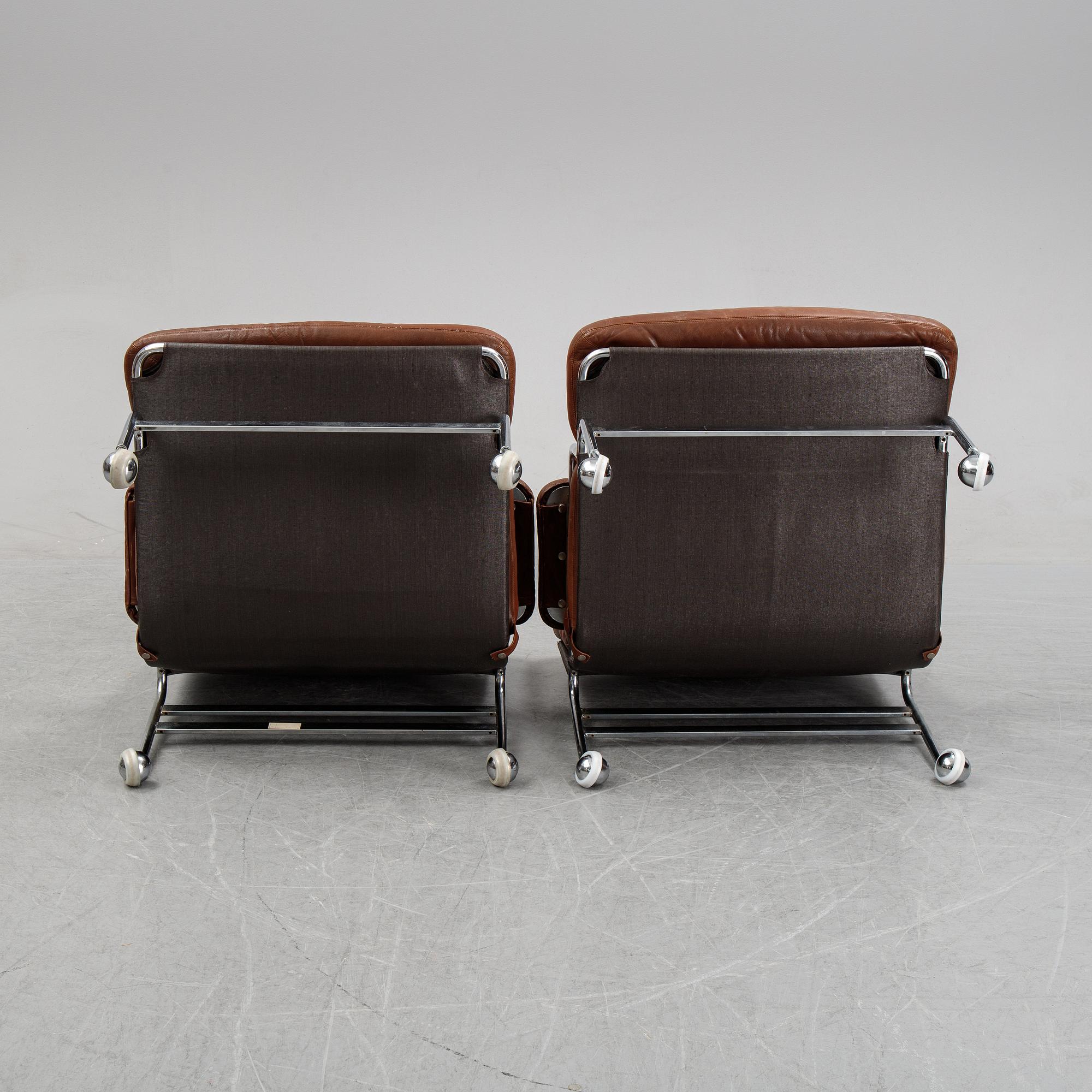 A pair of 'Karin' easy chairs by Bruno Mathsson for Dux, designed 1969.