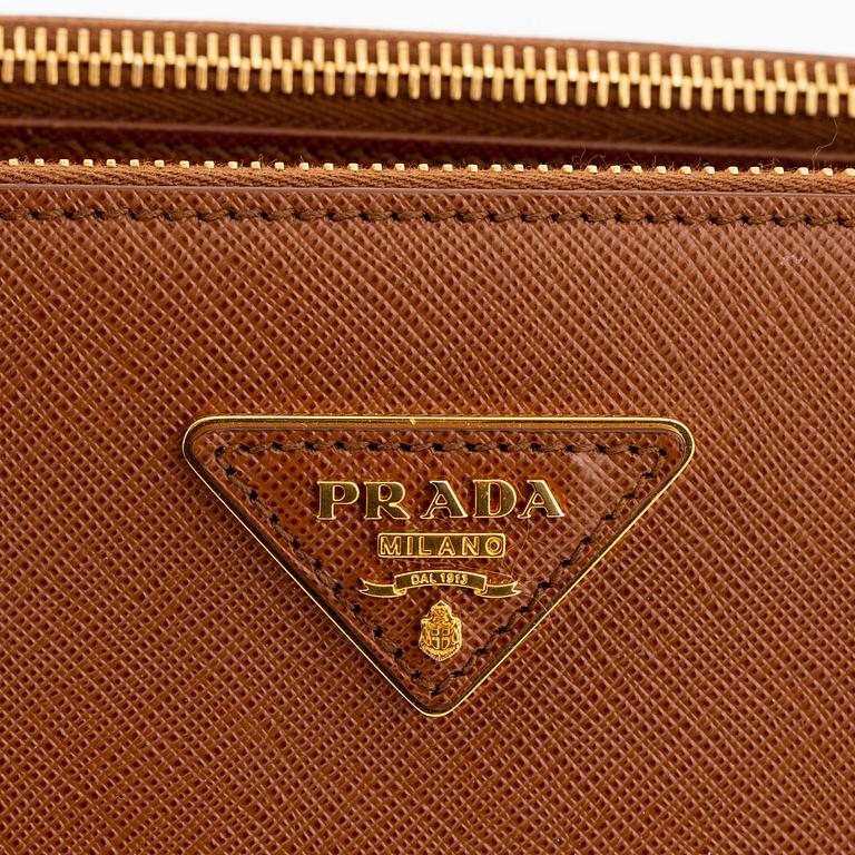 Prada, a brown Saffiano handbag.