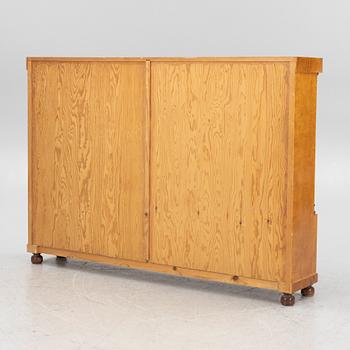 An Empire style bookcase, first half of the 20th century.