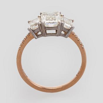 Ring, three baguette cut diamonds, small brilliant cut diamonds, 18K white gold and rose gold.