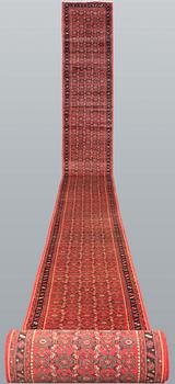 A Hosseinabad runner, approx. 1360 x 80 cm.