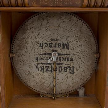 Polyphone with clock in walnut case, late 19th Century.