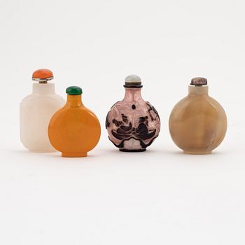 A group of four Chinese snuffbottles, 20th century.