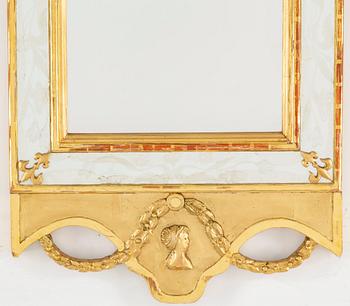 An empire style mirror, 20th century.