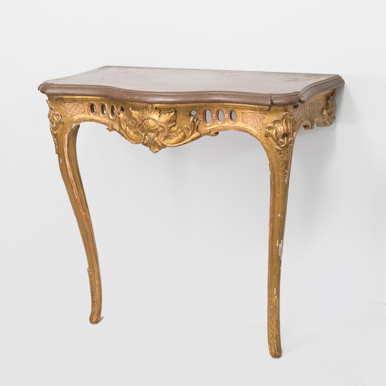 A rococo style console table,