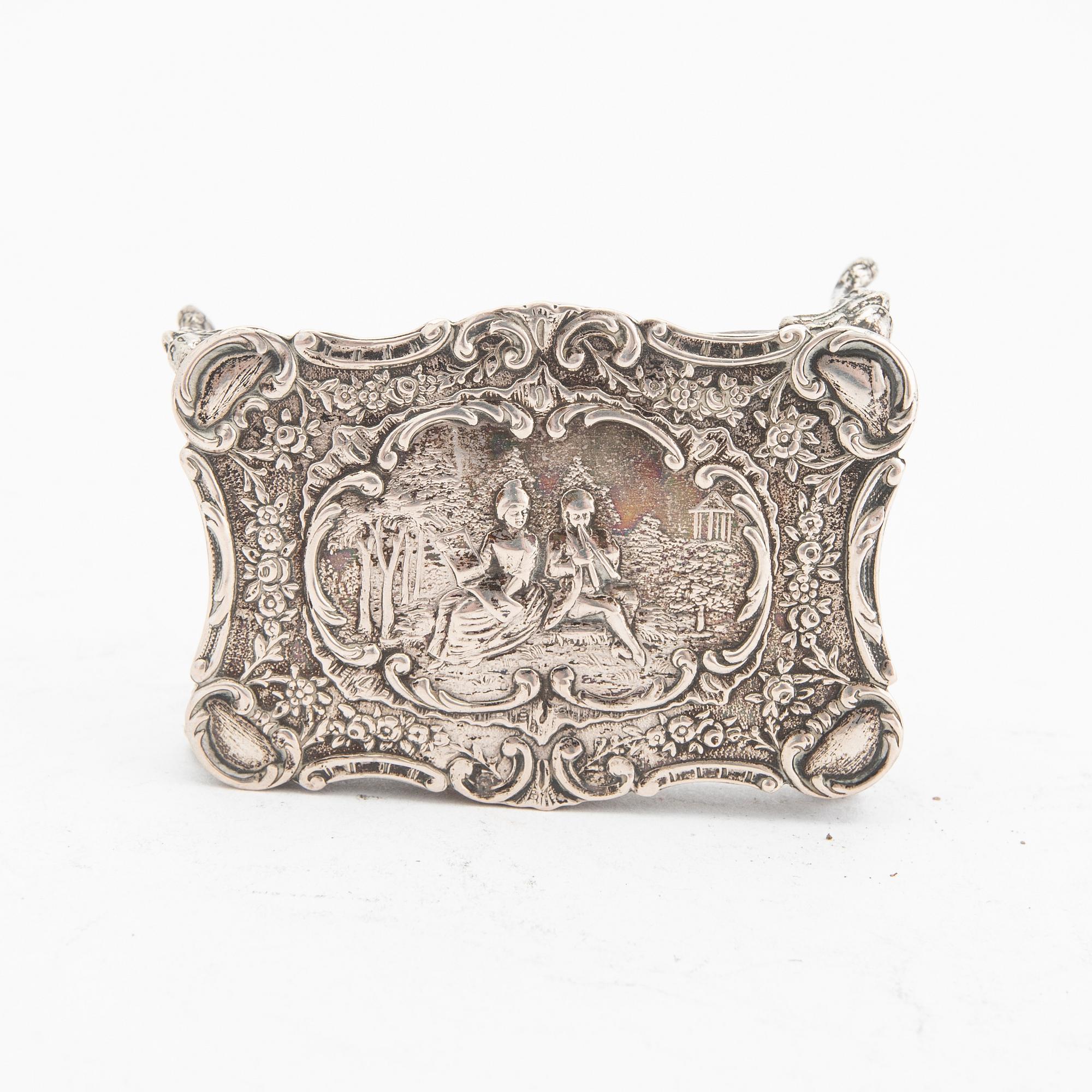 An early 20th century set of eight miniature furnitures in silver, weight 158 grams.