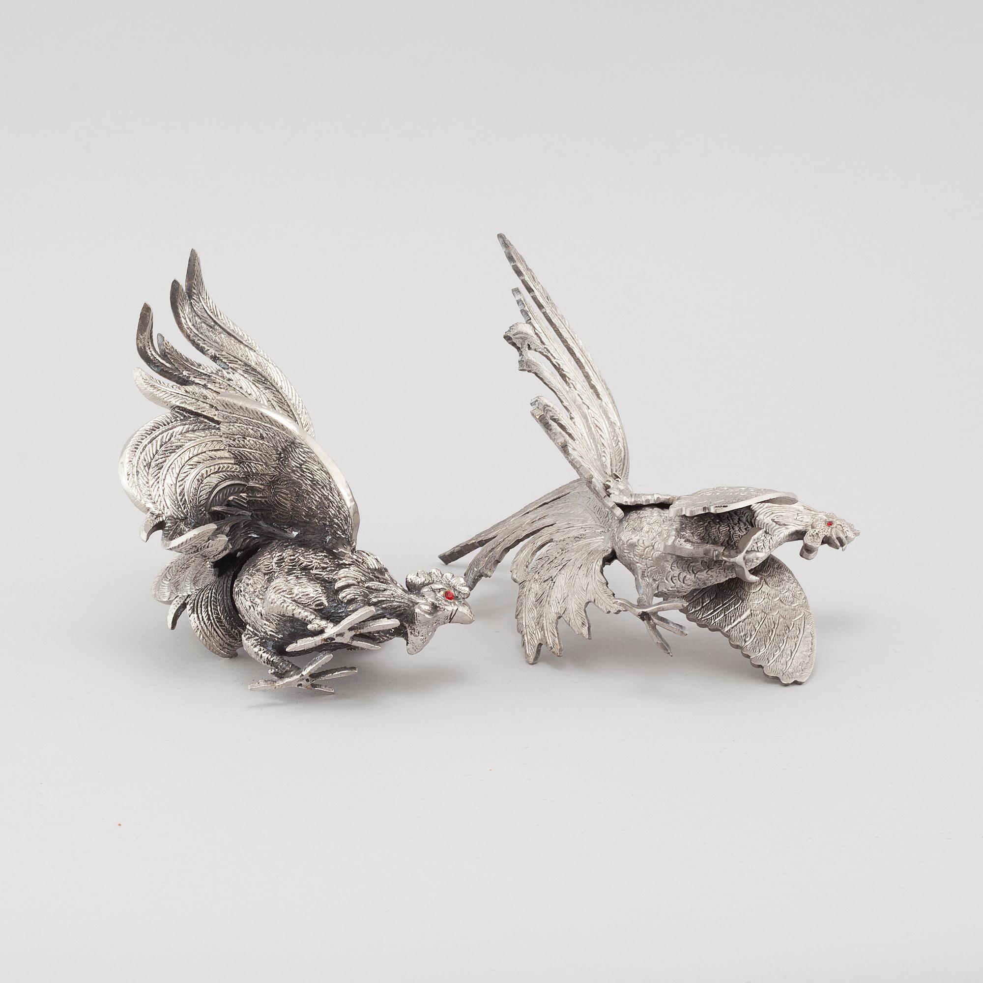 A pair of table decorations in white metal, second half of the 20th century.