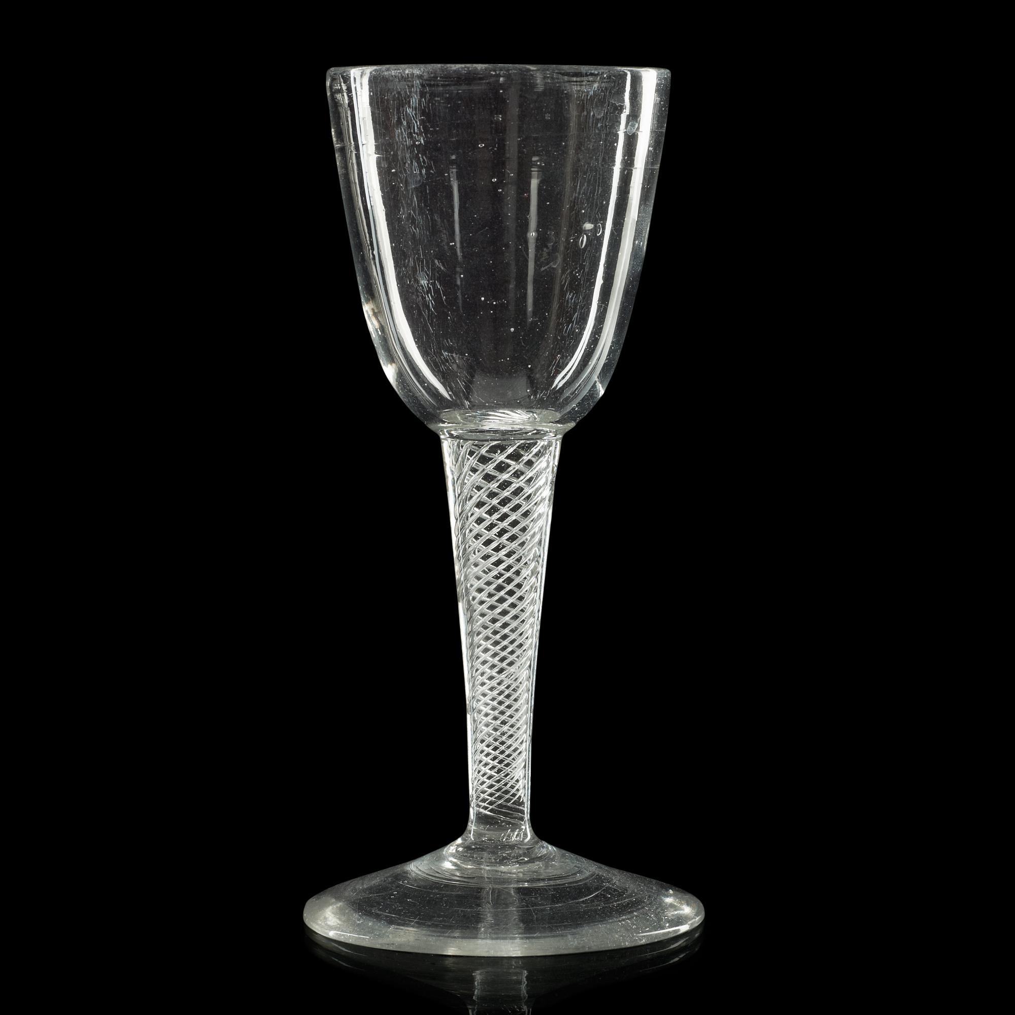 A set of eight wine glasses, England or Kungsholms glasbruk, 18th Century.