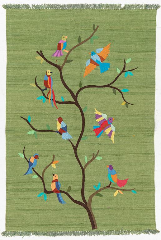 A hand-embroidered Kelim rug, 184 x 124 cm.