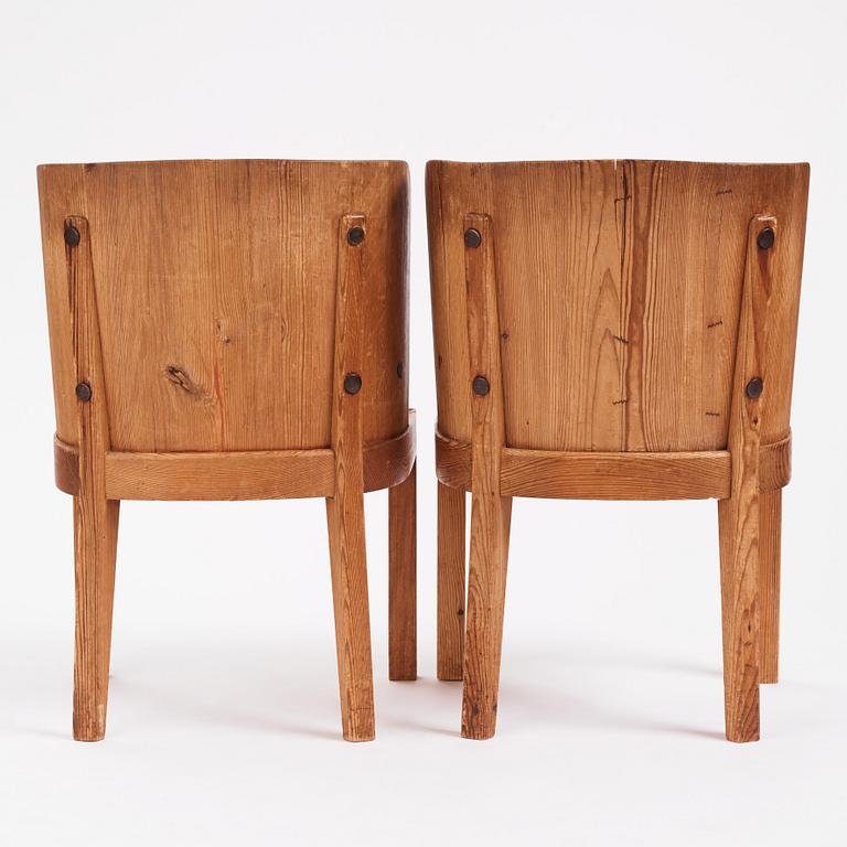 Axel Einar Hjorth, a pair of "Lovö" stained pine armchairs, Nordiska Kompaniet 1930s.