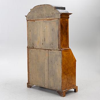A Swedish rococo burr-alder veneered cabinet, later part 18th century.