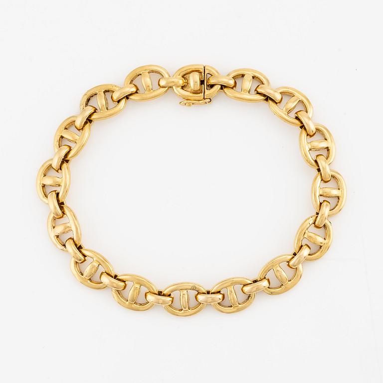 An 18K gold Cartier bracelet.