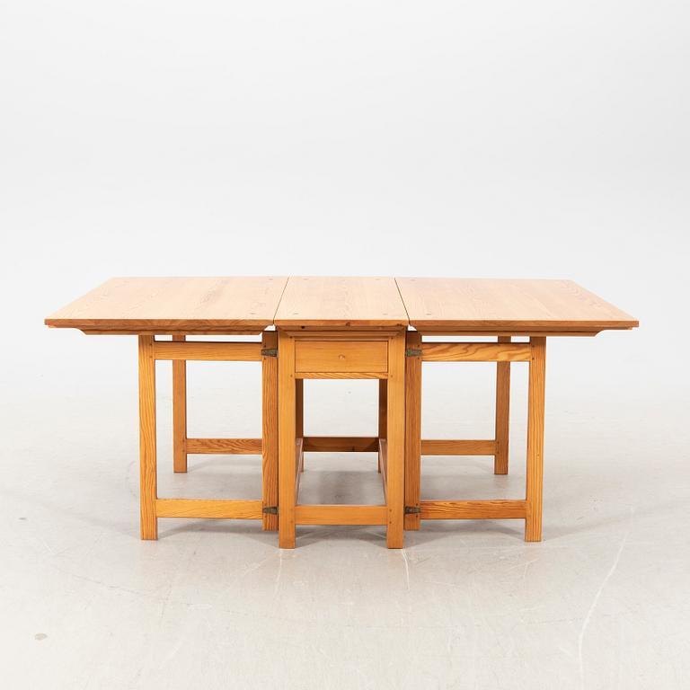A mid 20th century/second part pine folding table.