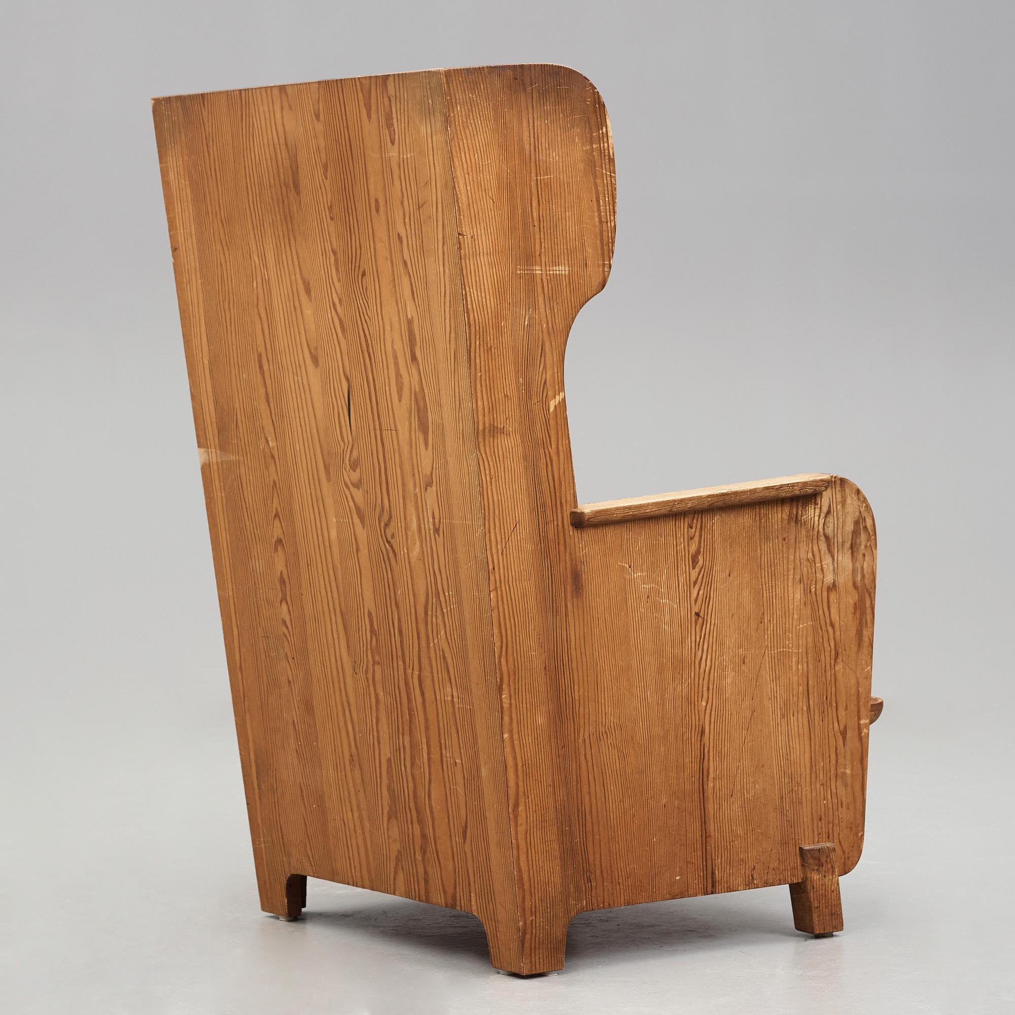 Axel Einar Hjorth, a stained pine "Lovö" armchair, Nordiska Kompaniet, Sweden 1930's.