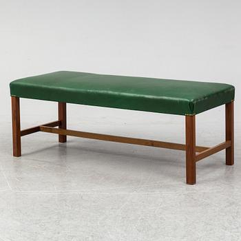 A bench "2082" by Josef Frank for Firma Svenskt Tenn.