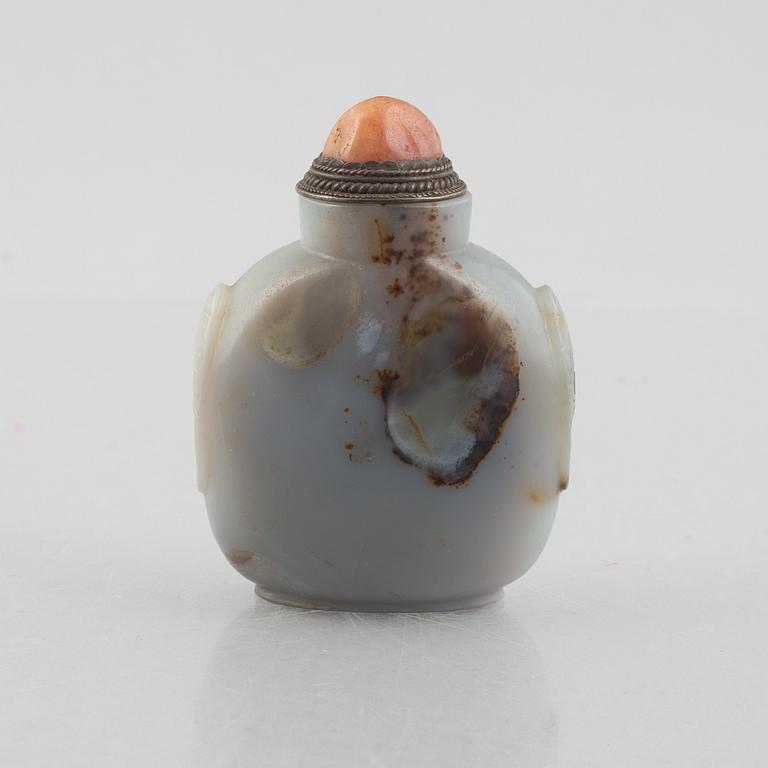 A group of three Chinese stone snuffbottles, 20th century.