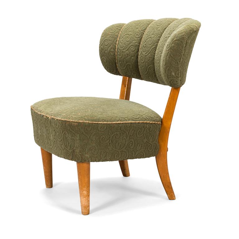 Lisa Johansson-Pape, a 1940's armchair for  Keravan Puusepäntehdas, Stockmann.