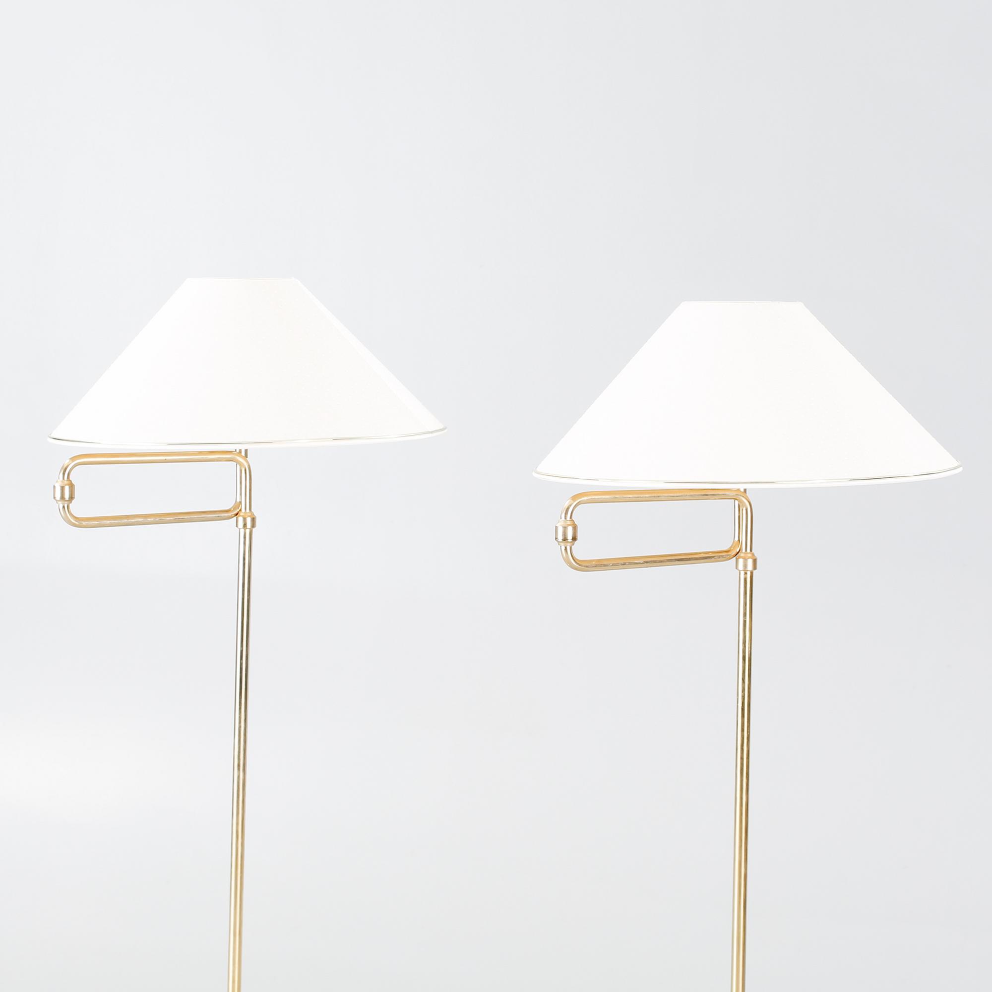 A pair of floor lamp from the latter half of the 20th century.