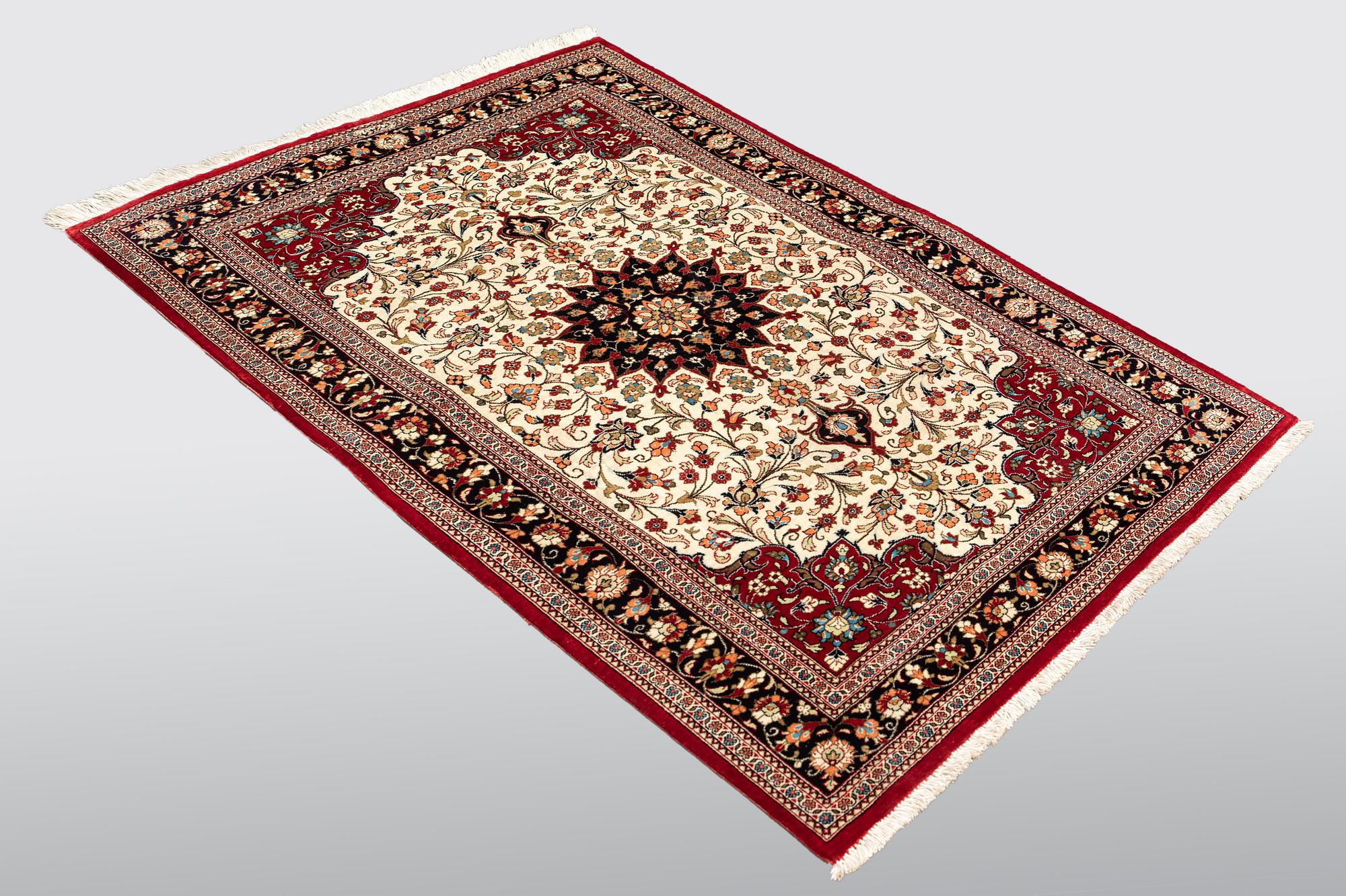 A carpet, Silk Qum, ca 116 x 75 cm.