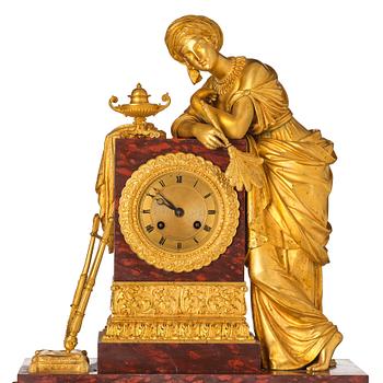 A French Empire ormolu and marble mantel clock 'à la sultane', first part of the 19th century.