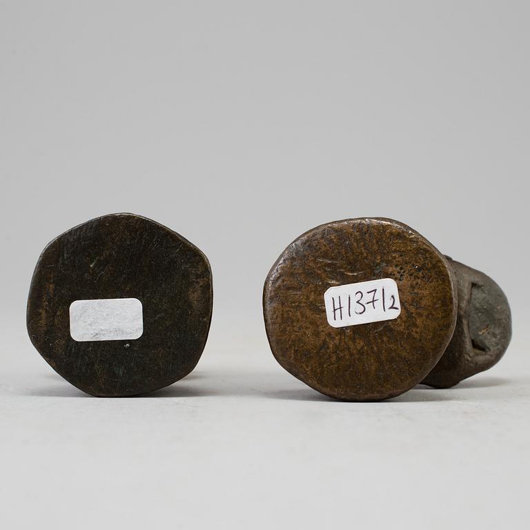 Two opium weights, Burma, circa 1900.