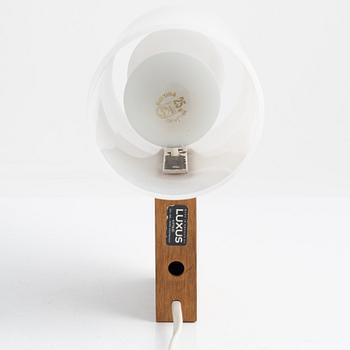 Uno & Östen Kristiansson, a wall light and a table light, Luxus, Vittsjö, Sweden.