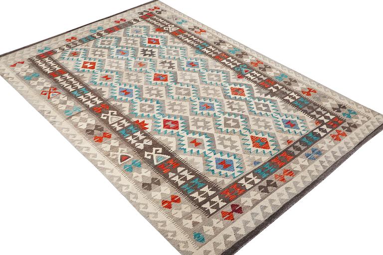 A Kilim carpet, c. 290 x 199 cm.