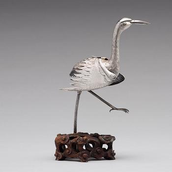 A silver crane, late Qing dynasty.