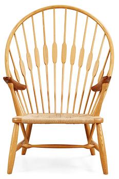 74. A Hans J Wegner ash and teak 'Peacock chair', Johannes Hansen, Denmark.