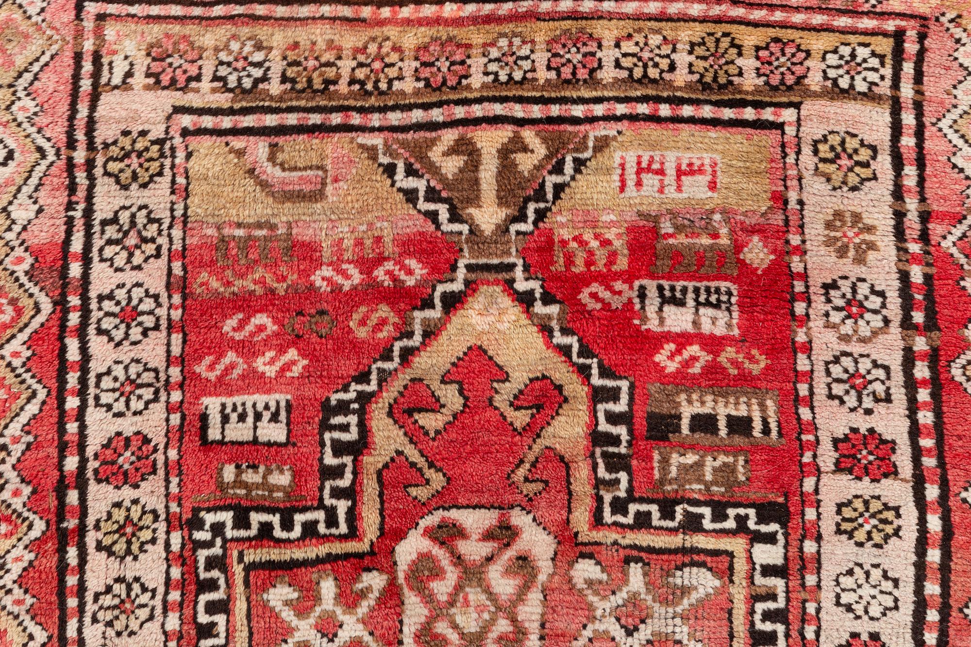 An oriental semi antique carpet, circa 272 x 120 cm.