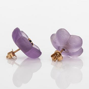 A pair of 14K gold earrings with cut amethyst and synthetic sapphires.