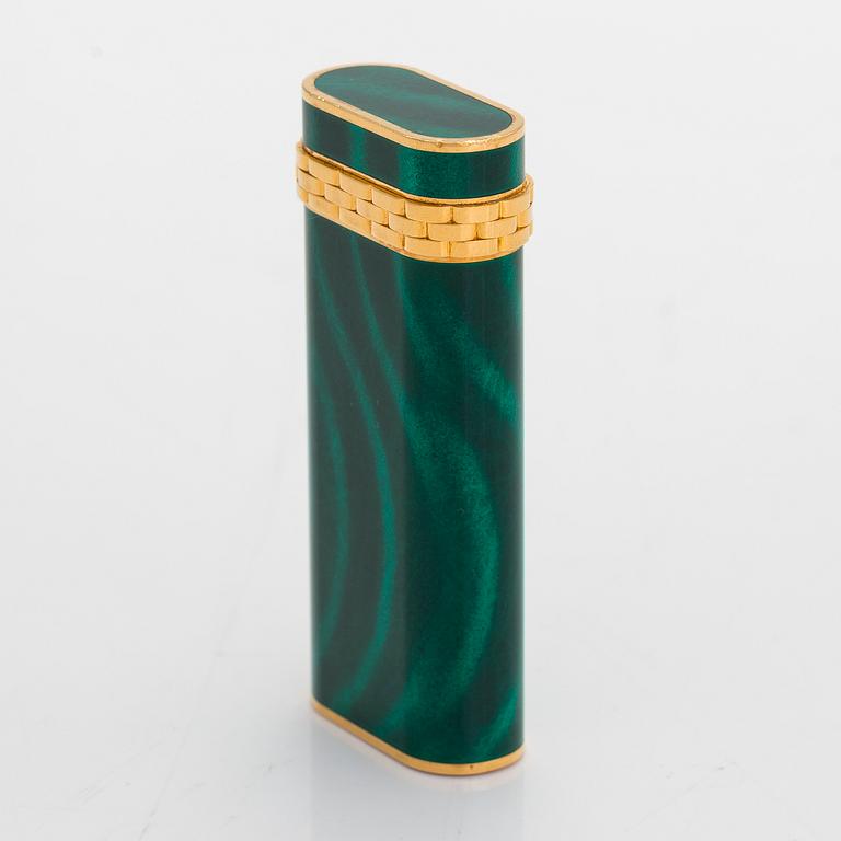 Cartier, A gilded and laquered metal lighter. Marked Cartier, Paris, 6846 X, Swiss made.