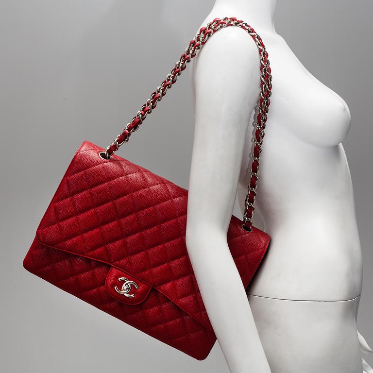 A red caviar "Classic Maxi" handbag by Chanel 2009-2010.