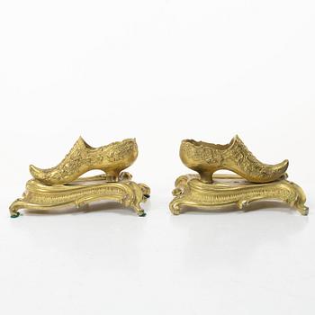Table ornaments in the form of shoes, a pair, fire-gilt bronze, probably France, 19th century.