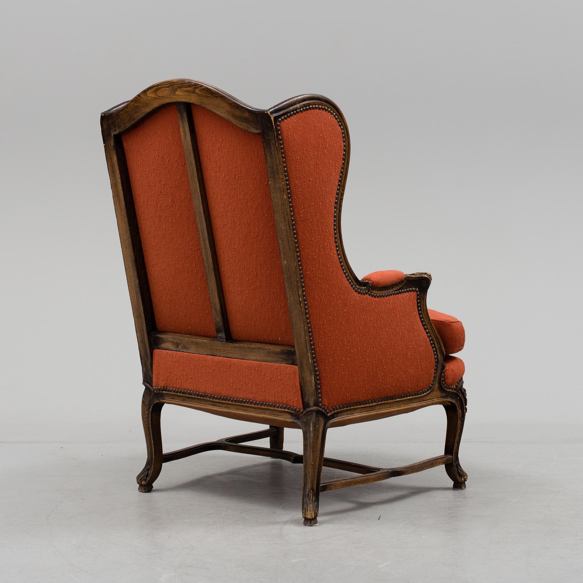 A Louis XV-style armchair, about 1900.