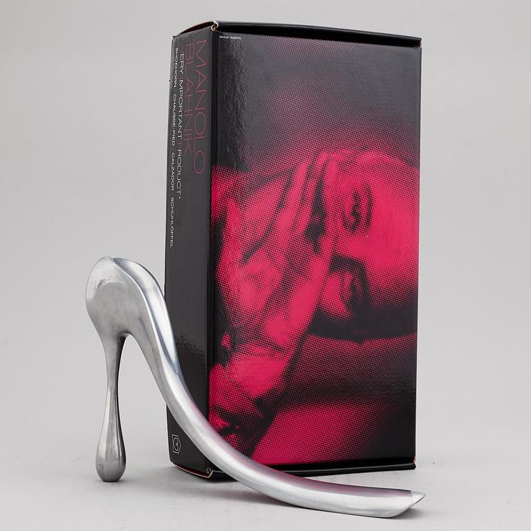 A Manolo Blahnik shoe horn, modern.