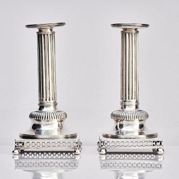 A pair of Swedish 18th century Gustavian silver candlesticks, marks of Arvid Floberg, Stockholm 1799.